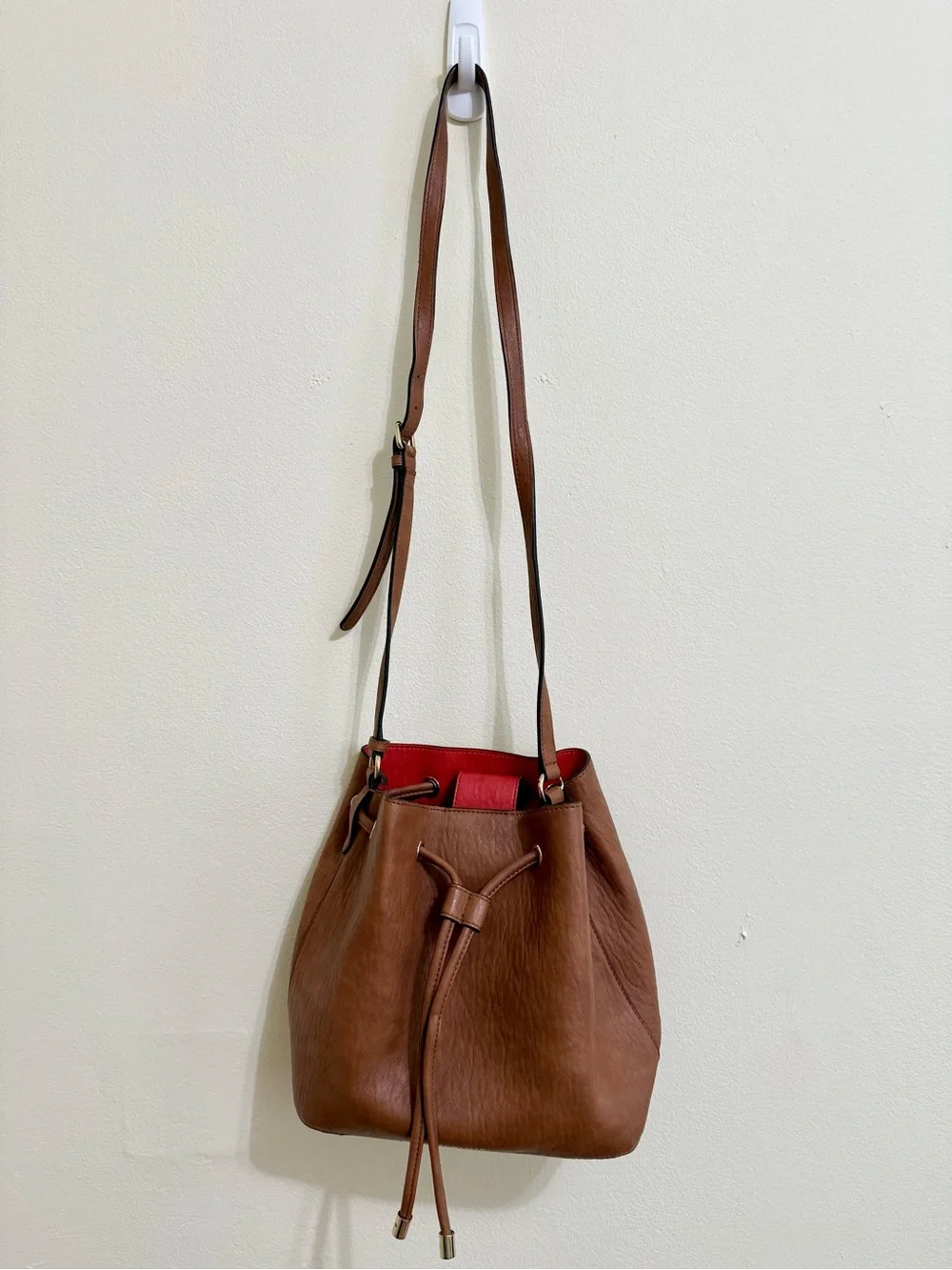 Calvin Klein Brown Leather Drawstring Crossbody with Coral Lining